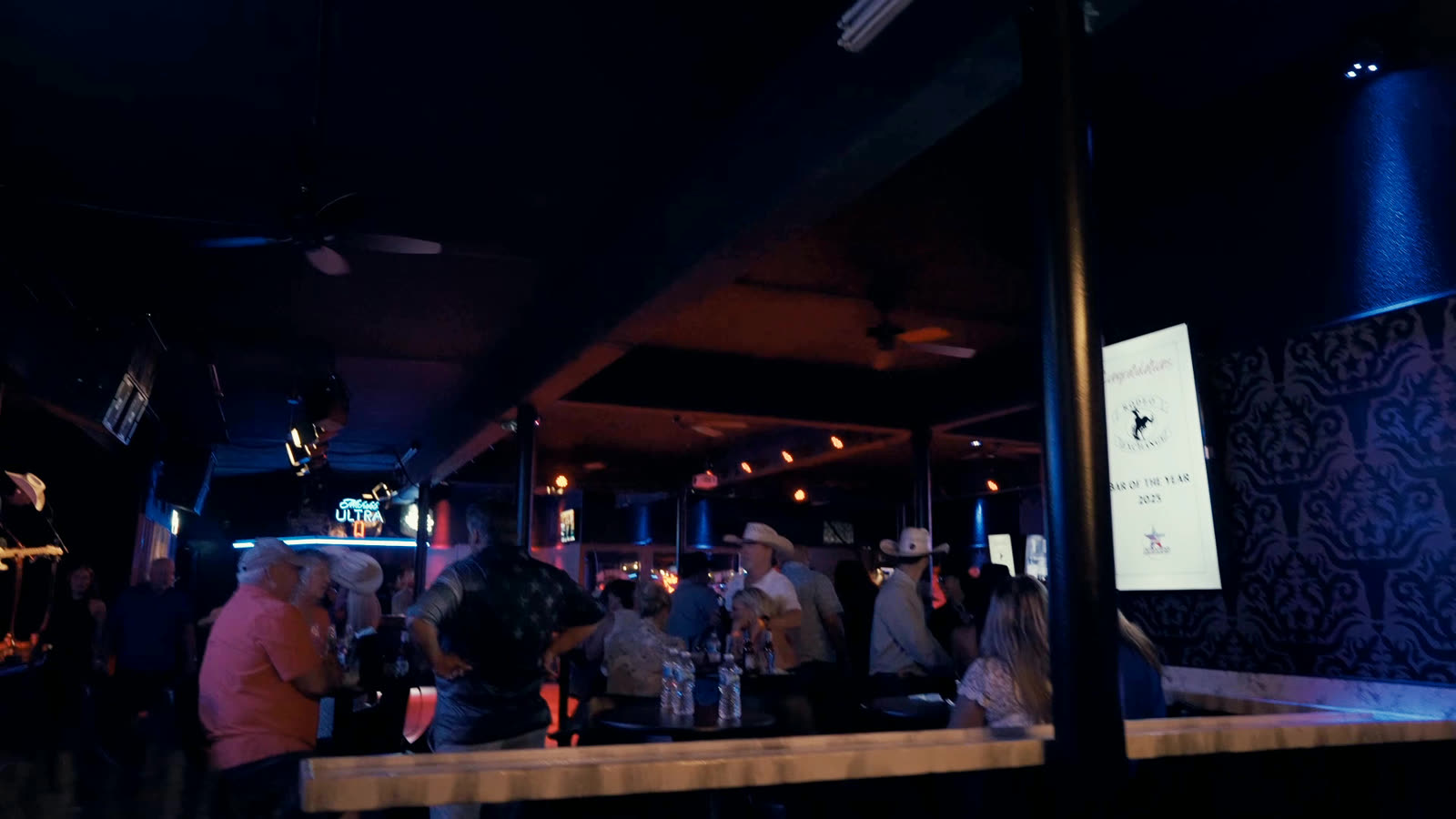 Reserved tables in the VIP corner, up off the dance floor.